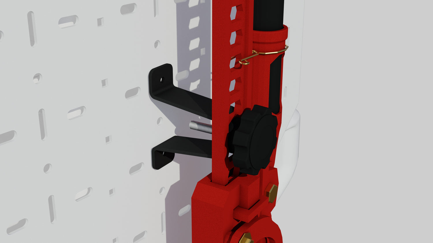 Red farm jack mounted on a white perforated panel using a black metal bracket.