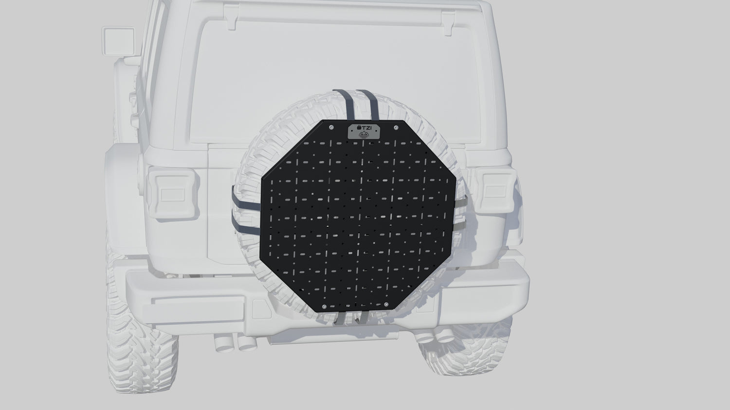 Black octagonal spare tire cover with grid pattern mounted on a white off-road vehicle.