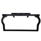 Black metal dash mount panel frame with cutouts and screw holes.