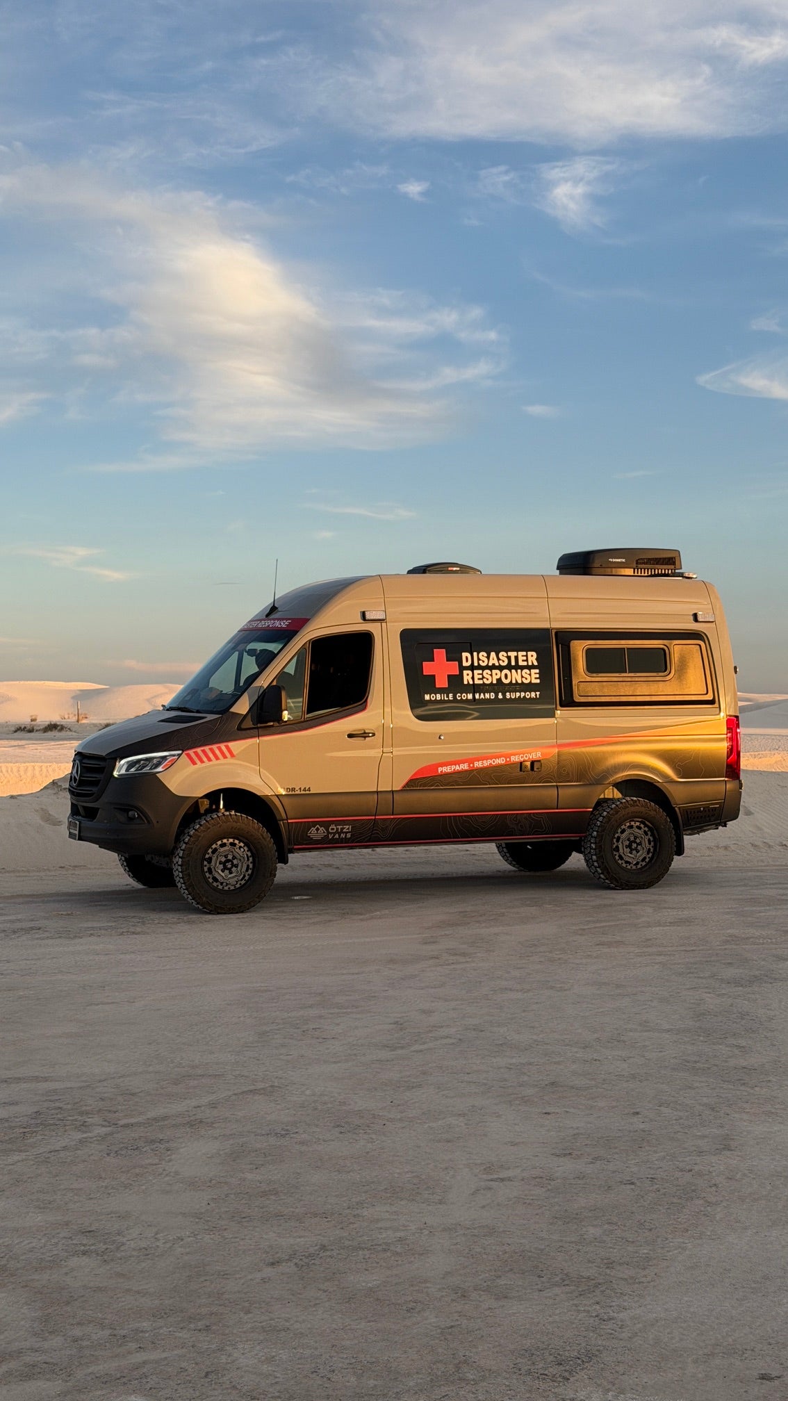 Side profile of the Otzi ASDR-144 disaster response platform at dusk