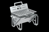 Portable stainless steel grill with adjustable grate and foldable legs.