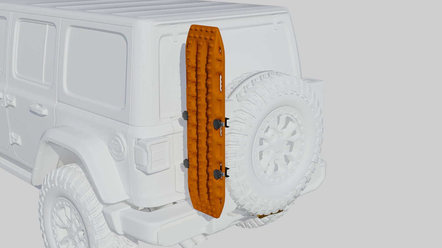 Orange traction board mounted vertically on the rear of an off-road vehicle.