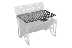 Modular outdoor fire pit with removable grill grate, shown in angled view.
