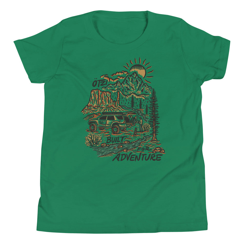 Green graphic t-shirt featuring a mountain scene, SUV, and the text 'Built for Adventure'.